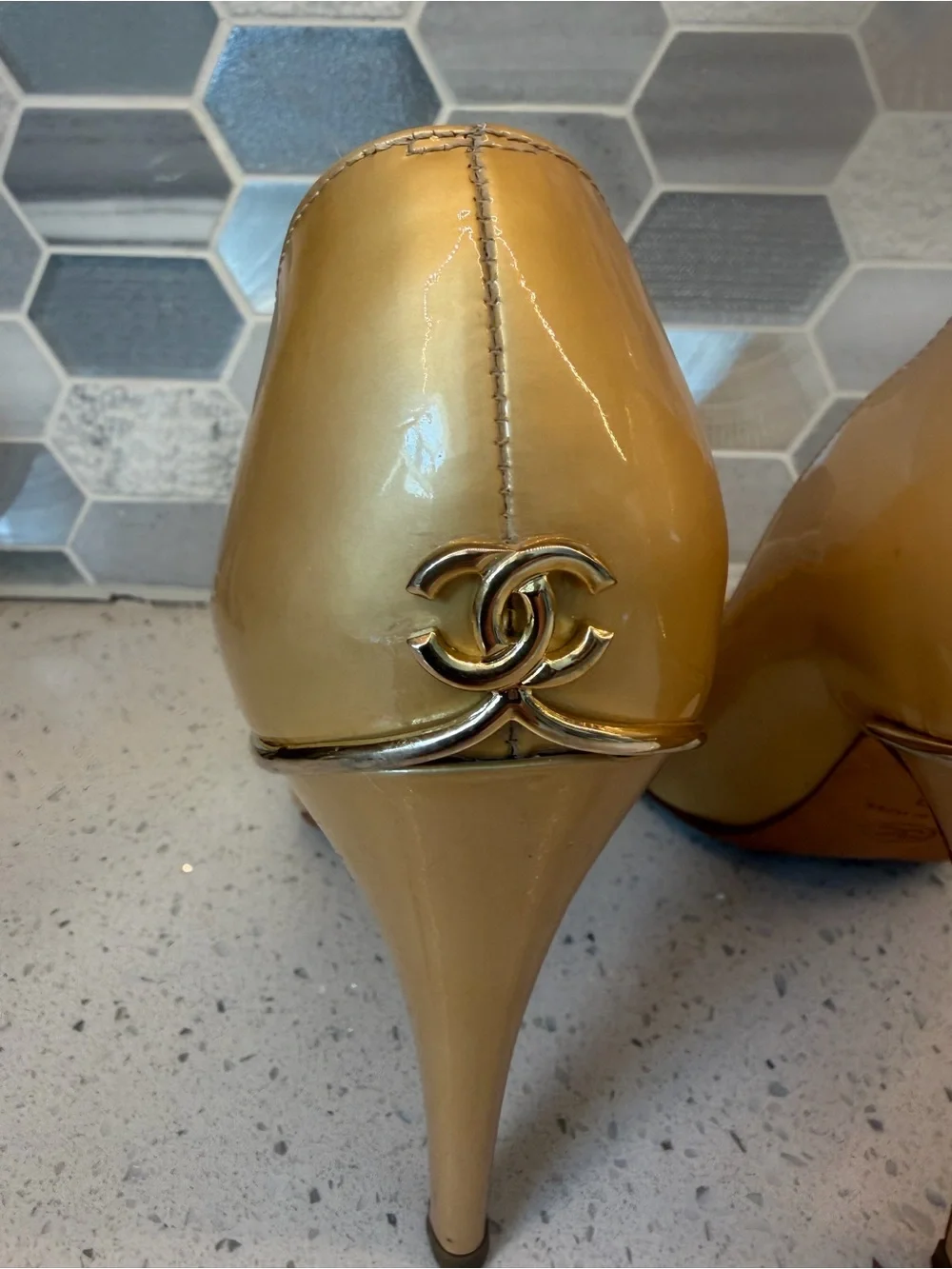 Name Your Price. CHANEL Gold Patent Leather Heels with CC Logo
